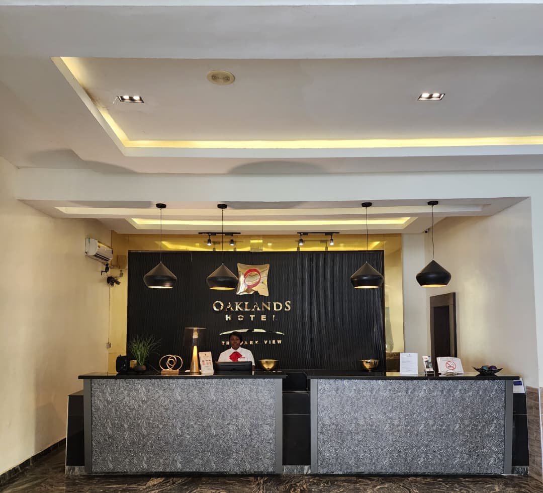 The reception desk beneath the Oaklands wordmark