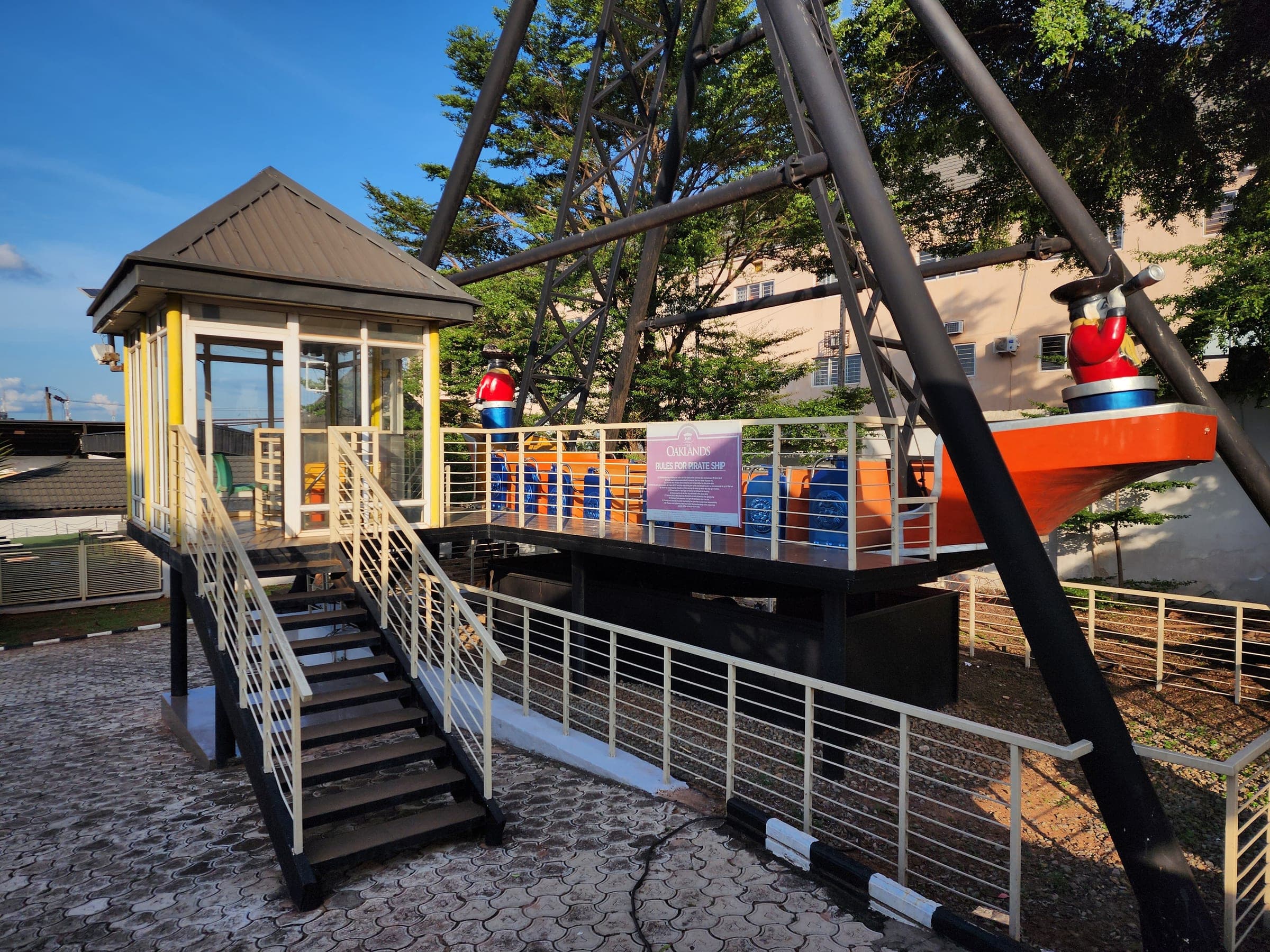 The pirate ship ride and its operator booth